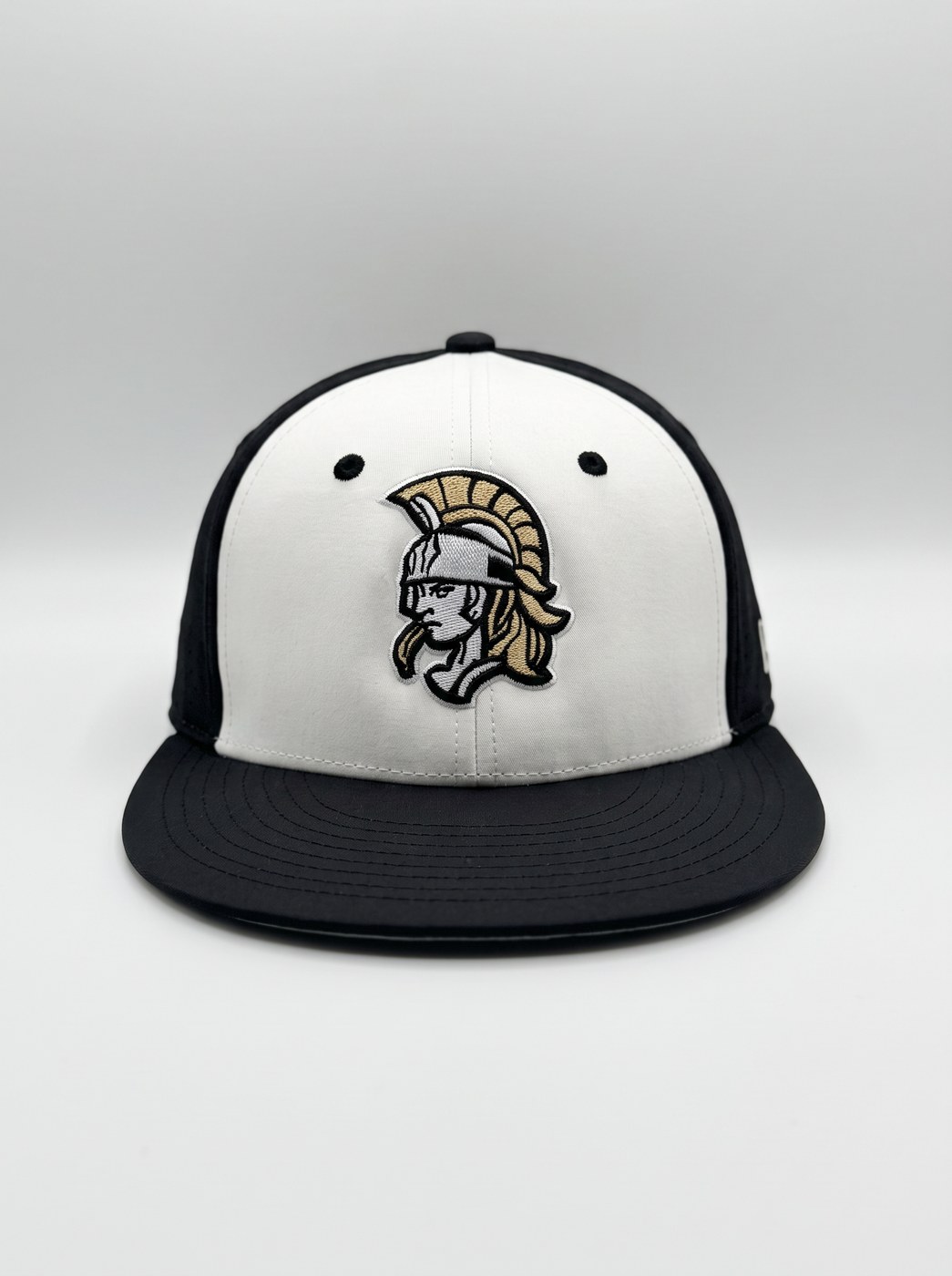White Victory Softball cap with black brim and embroidered gold and white warrior head